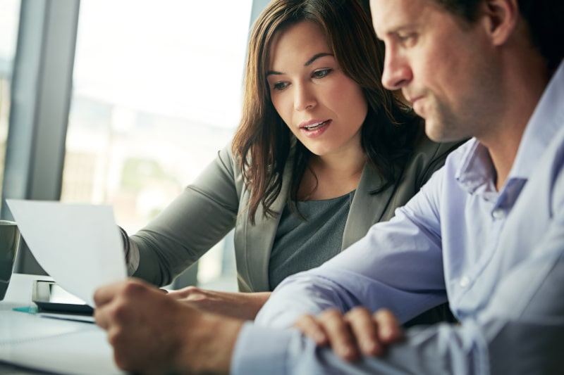 A Fords Daly Legal solicitor explaining the executry process and paperwork to a client in Fife