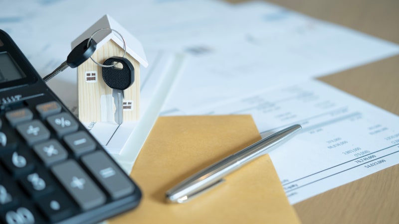 Estate planning documents and legal paperwork arranged on a desk, representing comprehensive planning services