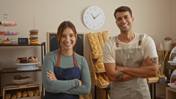 Business owner settling into newly purchased commercial property, representing successful completion