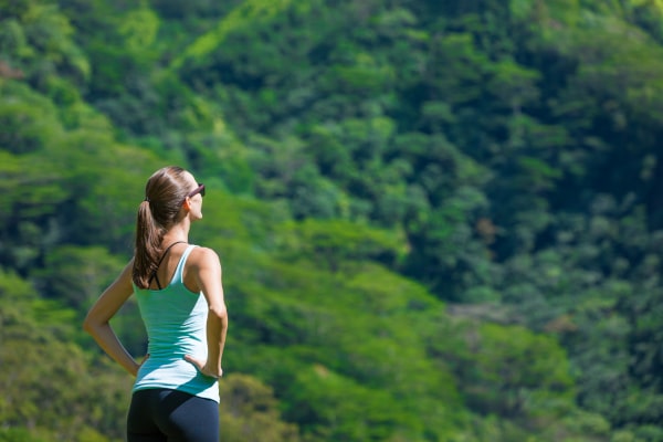 Confident person looking towards a positive future, ready to take the next step forward